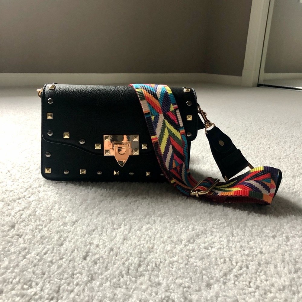 Crossbody black, gold, and multi-strap purse
